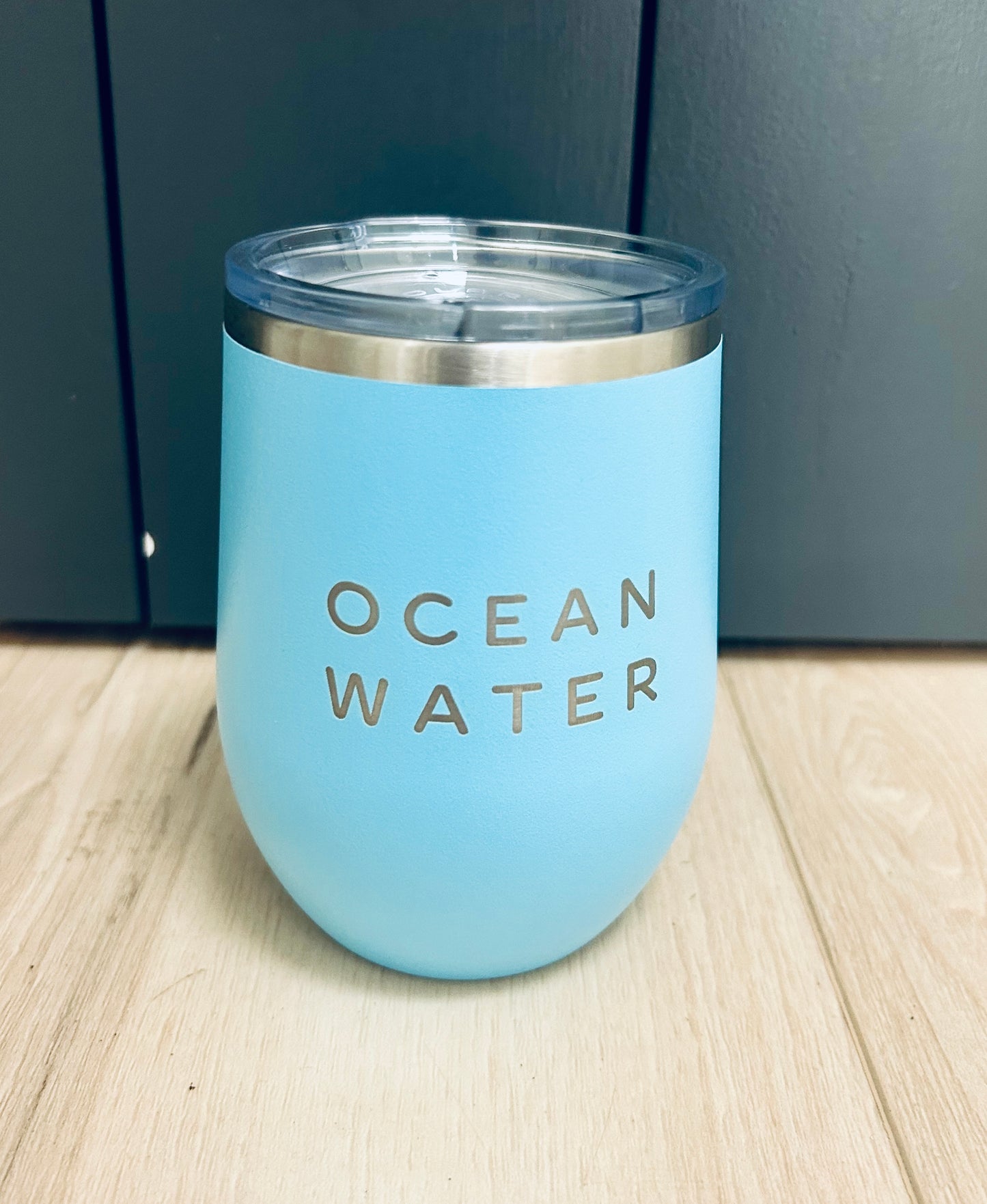 Locally made in Charleston Locally sourced in Charleston light blue tumbler with "Ocean Water" text on a light background