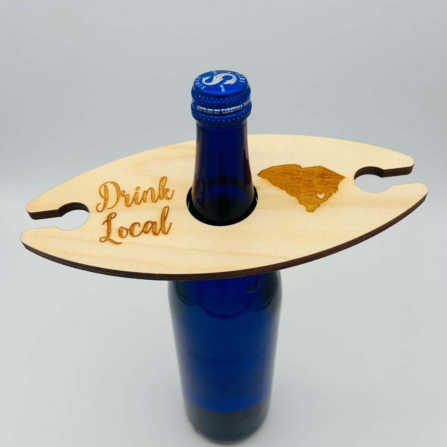 Locally made in Charleston, SC. Show off your love for local with this handcrafted wooden wine butler! Made by a local small business, it’s the perfect way to display and carry your favorite bottle and glasses in style.