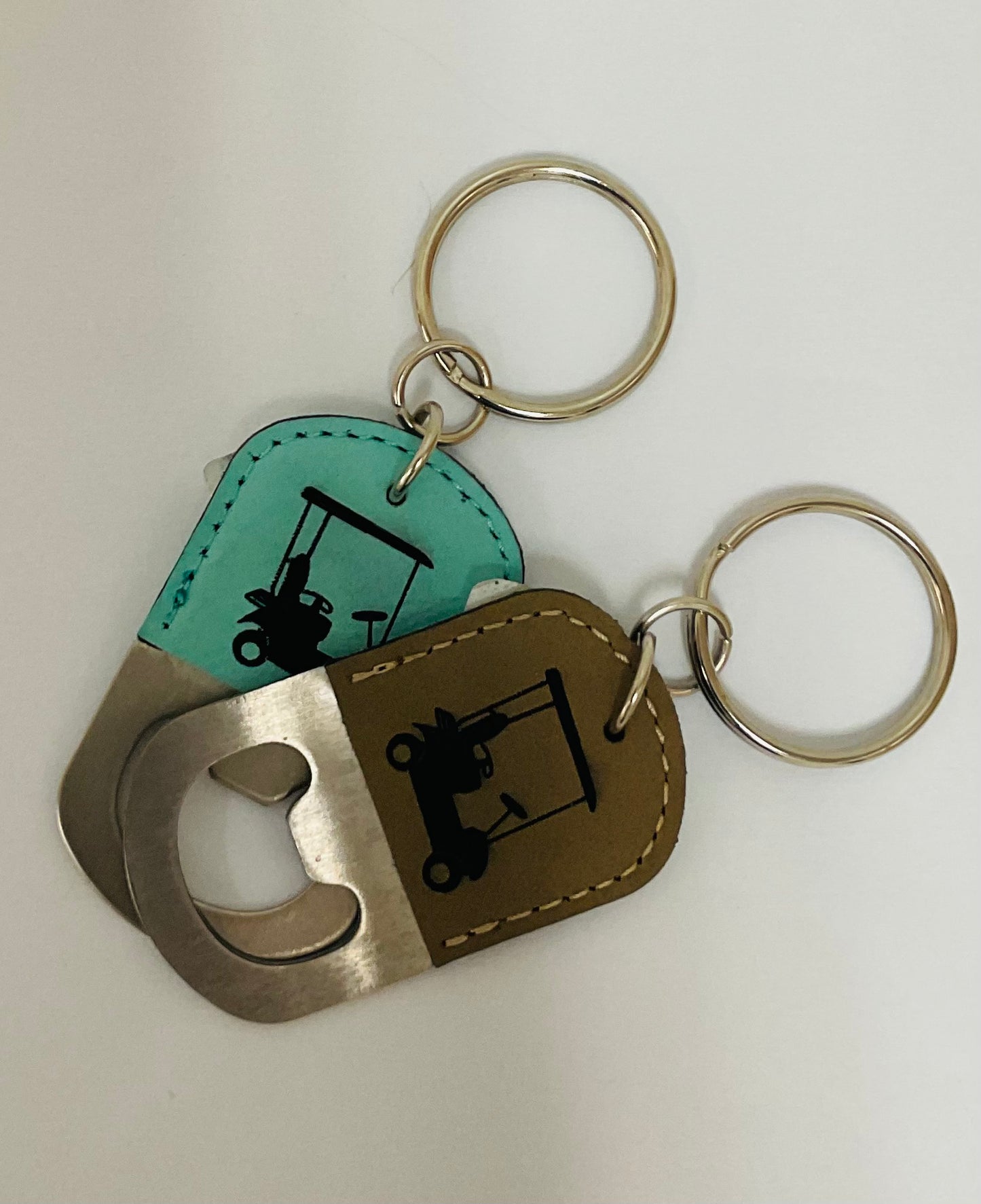 These faux leather bottle opener key rings are custom engraved.Key rings measure approximately 1.5″ wide and 2.5″ tall.Engraving is permanent and doesn’t wash off or peel off. Locally made in Charleston, SC.
