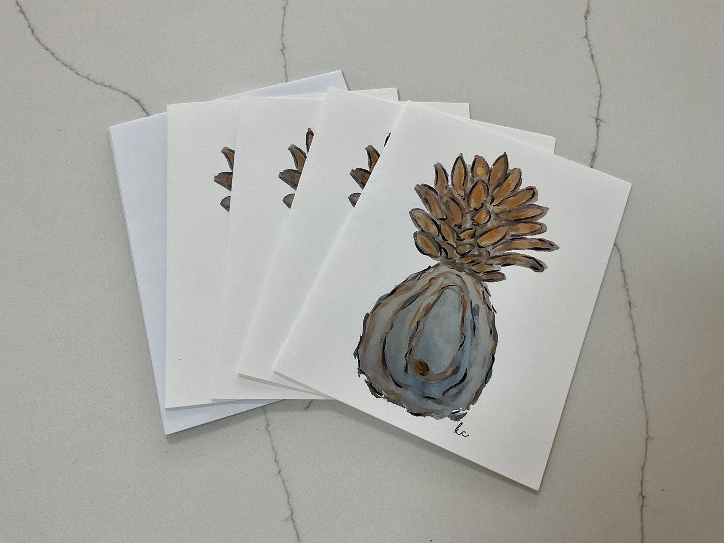 The Southern Welcome custom logo notecards. An artistic rendition of our logo by the talented Kimi Cole from Half Pint Designs. Locally made in Charleston, SC.
The Oyster and Pineapple combine to make ~ The Southern Welcome