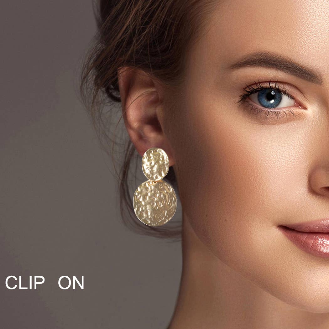Round hammered metal clip on earring