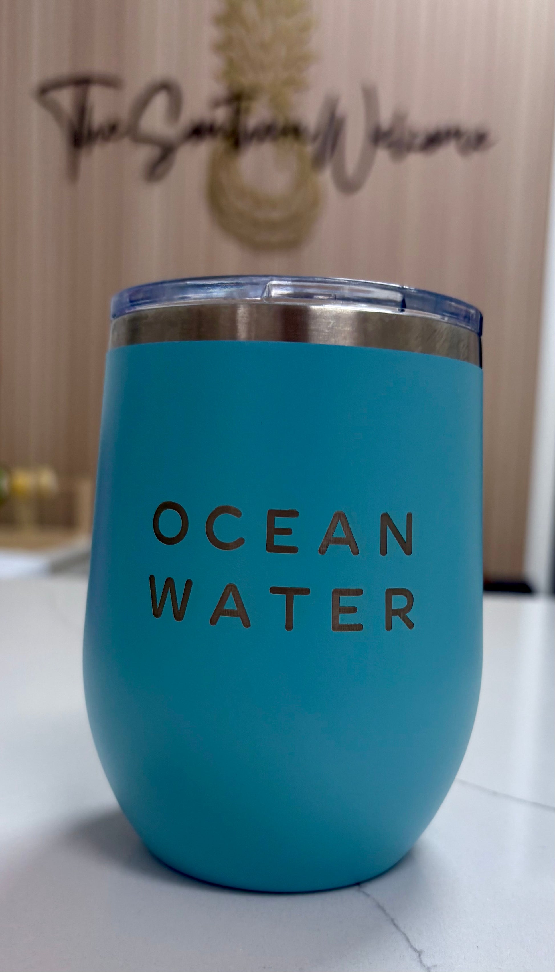 Locally made in Charleston Locally sourced in Charleston Teal tumbler with "Ocean Water" text on a light background