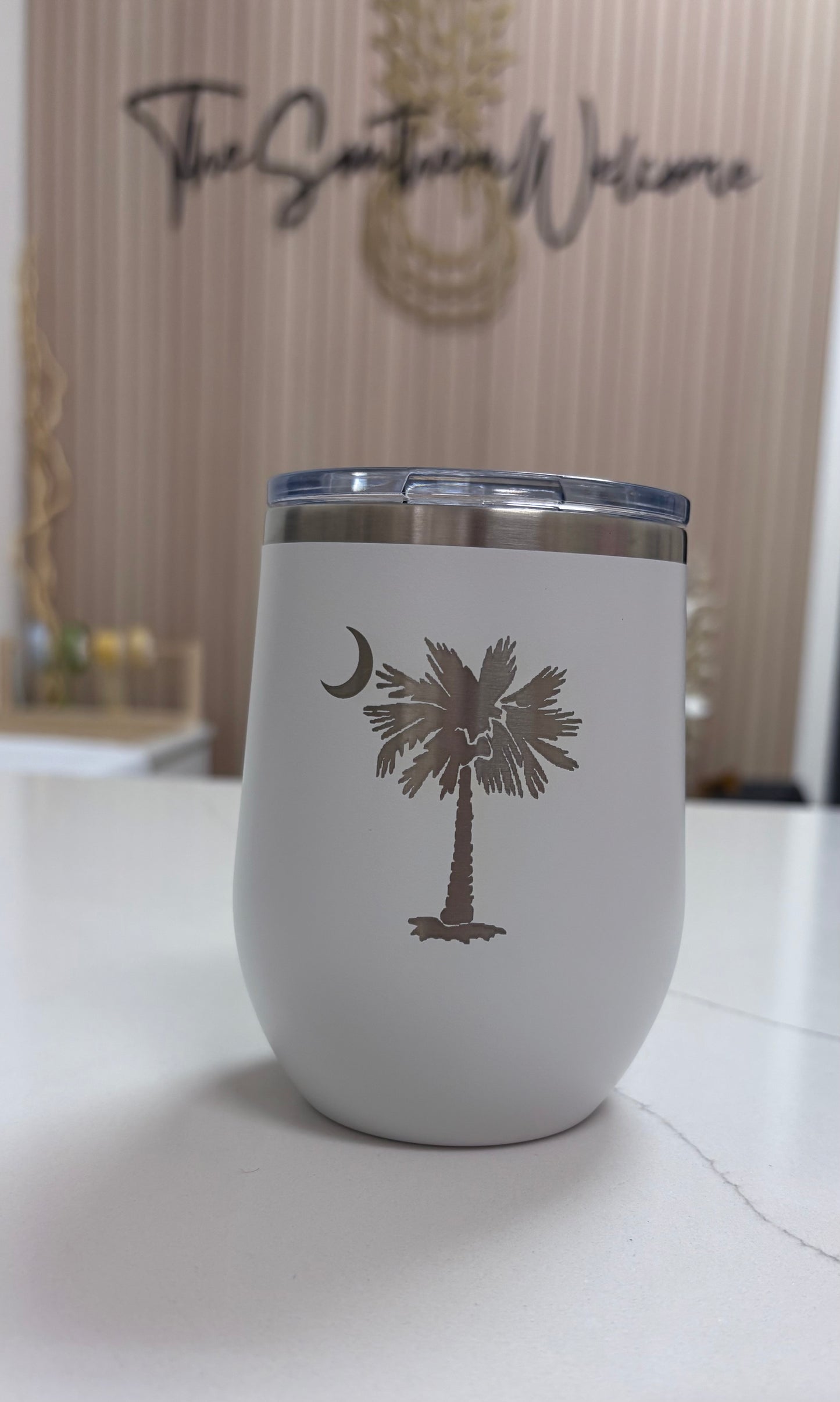 Locally made in Charleston Locally sourced in Charleston White tumbler with Palm Tree on a light background