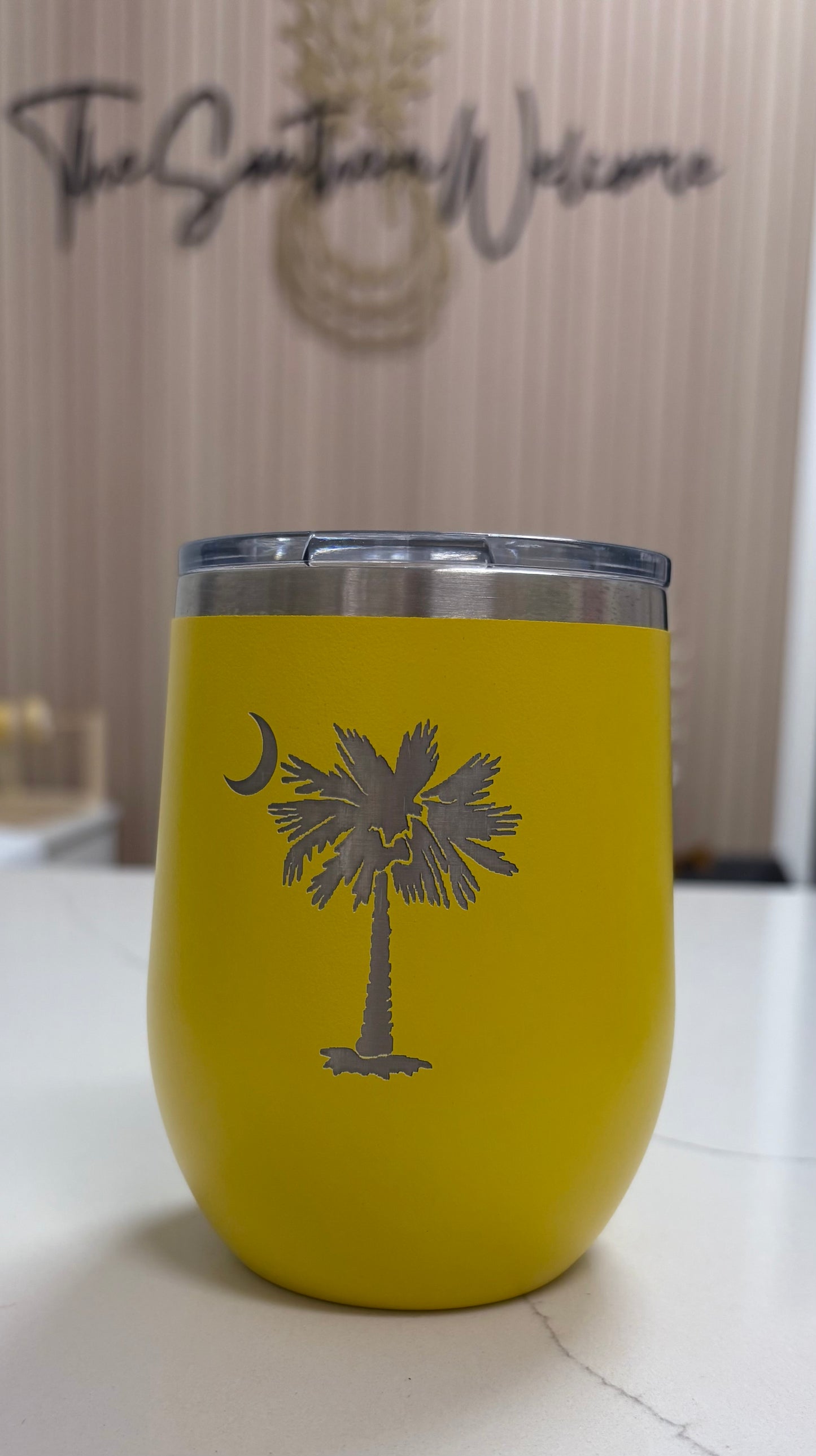 Locally made in Charleston Locally sourced in Charleston Yellow tumbler with Palm Tree on a light background