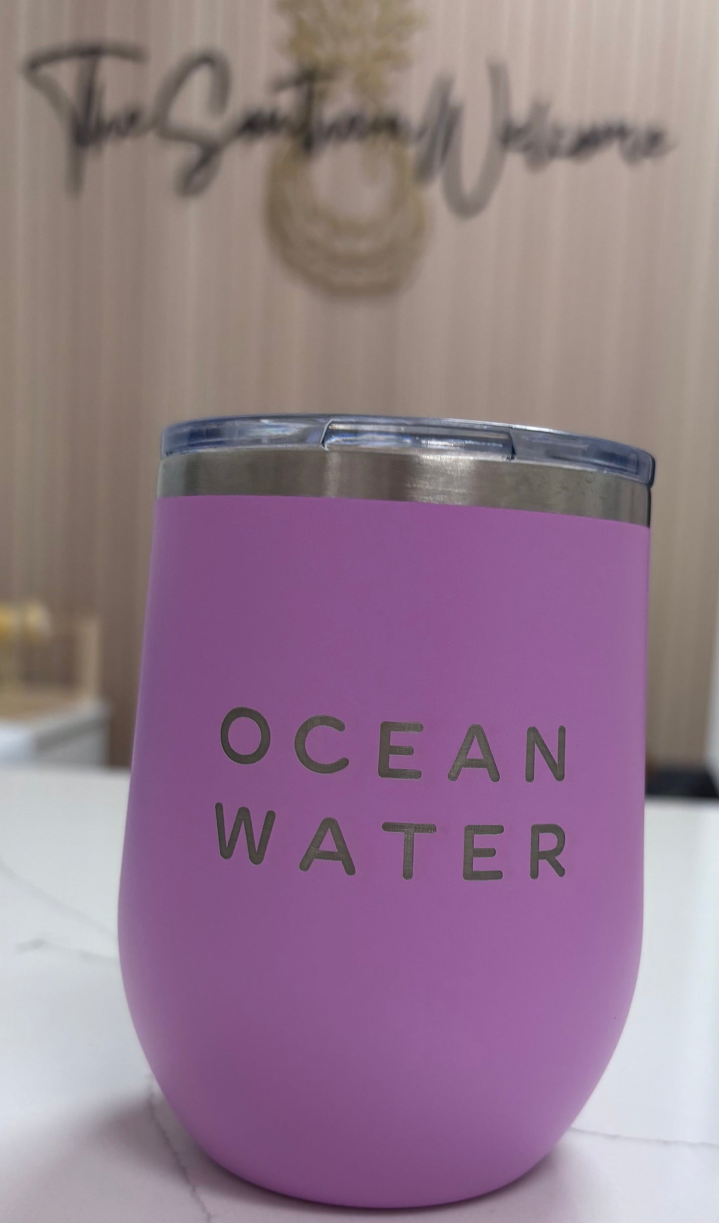 Locally made in Charleston Locally sourced in Charleston Purple tumbler with "Ocean Water" text on a light background