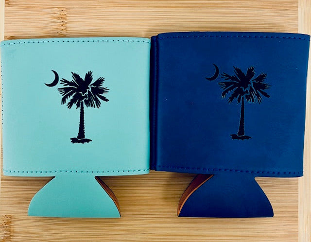 Locally made in Charleston. Elevate your drinkware with our stylish faux leather koozies, custom engraved for a personal touch. Durable, sleek, and designed to keep your beverage cold and your hands dry — perfect for weddings, gifts, tailgates, or everyday sipping in style.
