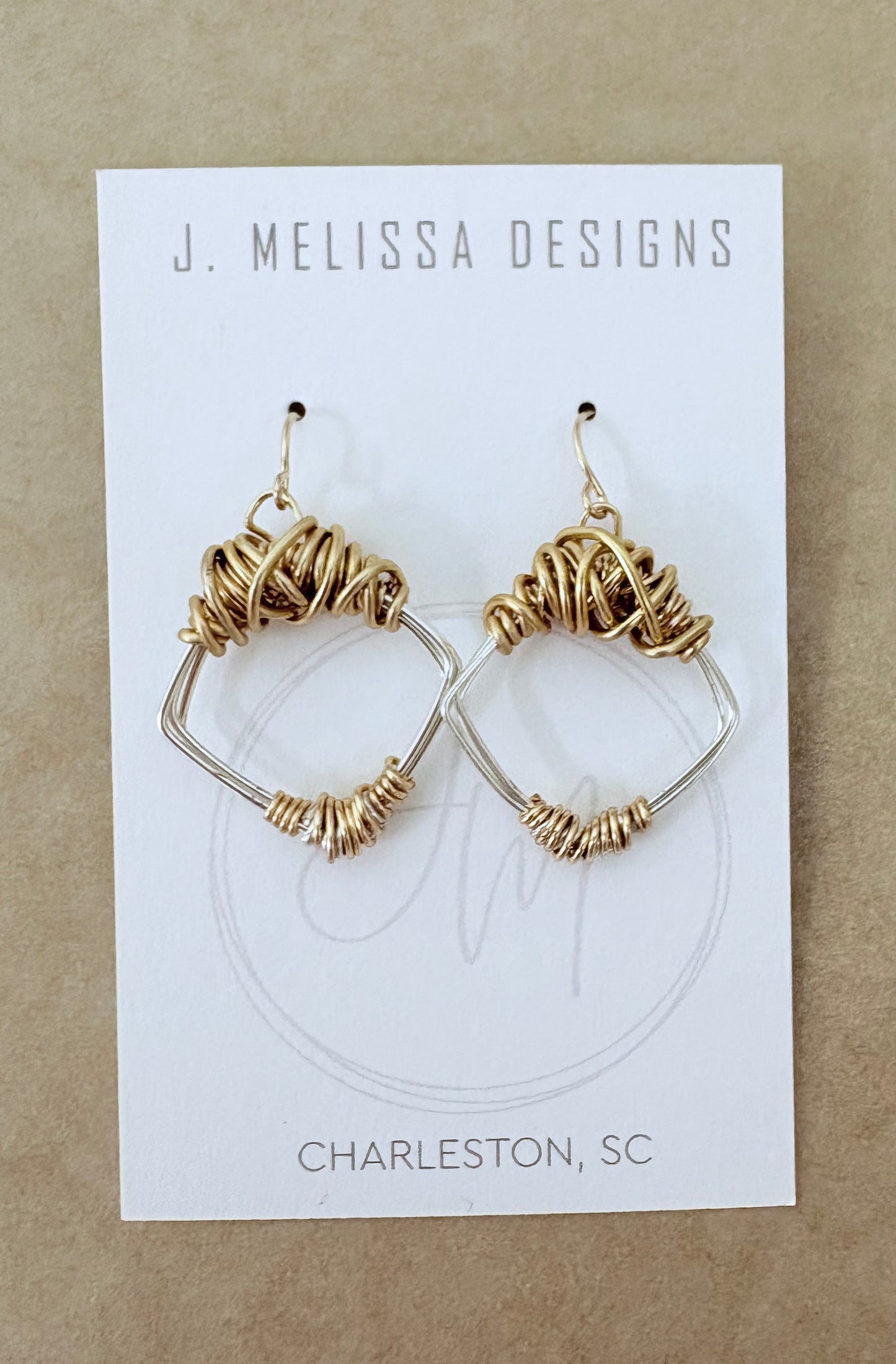 Gold hoop earrings on a J. Melissa Designs card with 'Charleston, SC' text. ~ local Charleston jewelry