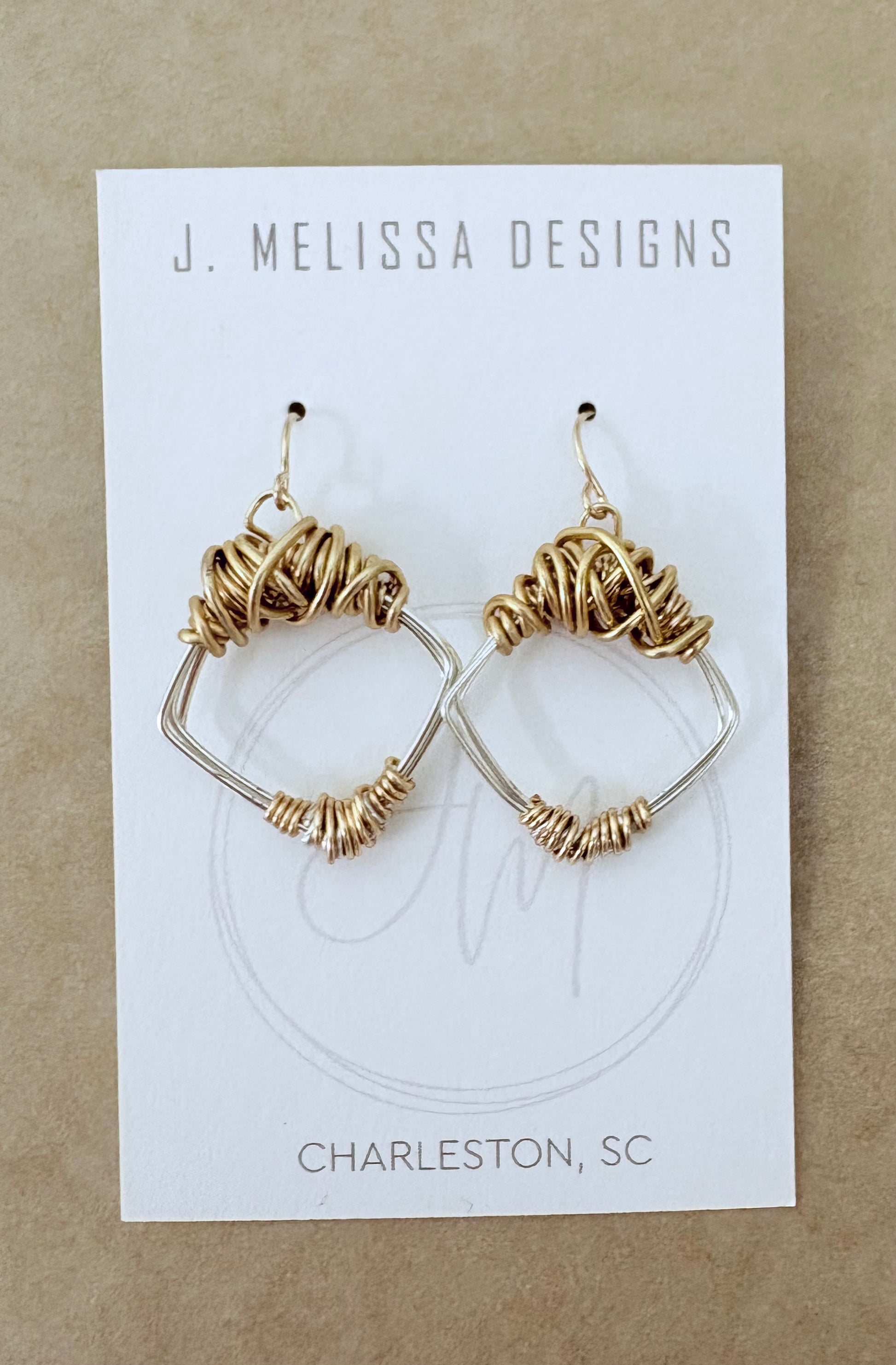 Gold hoop earrings on a J. Melissa Designs card with 'Charleston, SC' text. ~ local Charleston jewelry