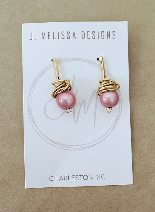 Pair of pink pearl earrings on a J. Melissa Designs card with 'Charleston, SC' text. ~ local Charleston jewelry