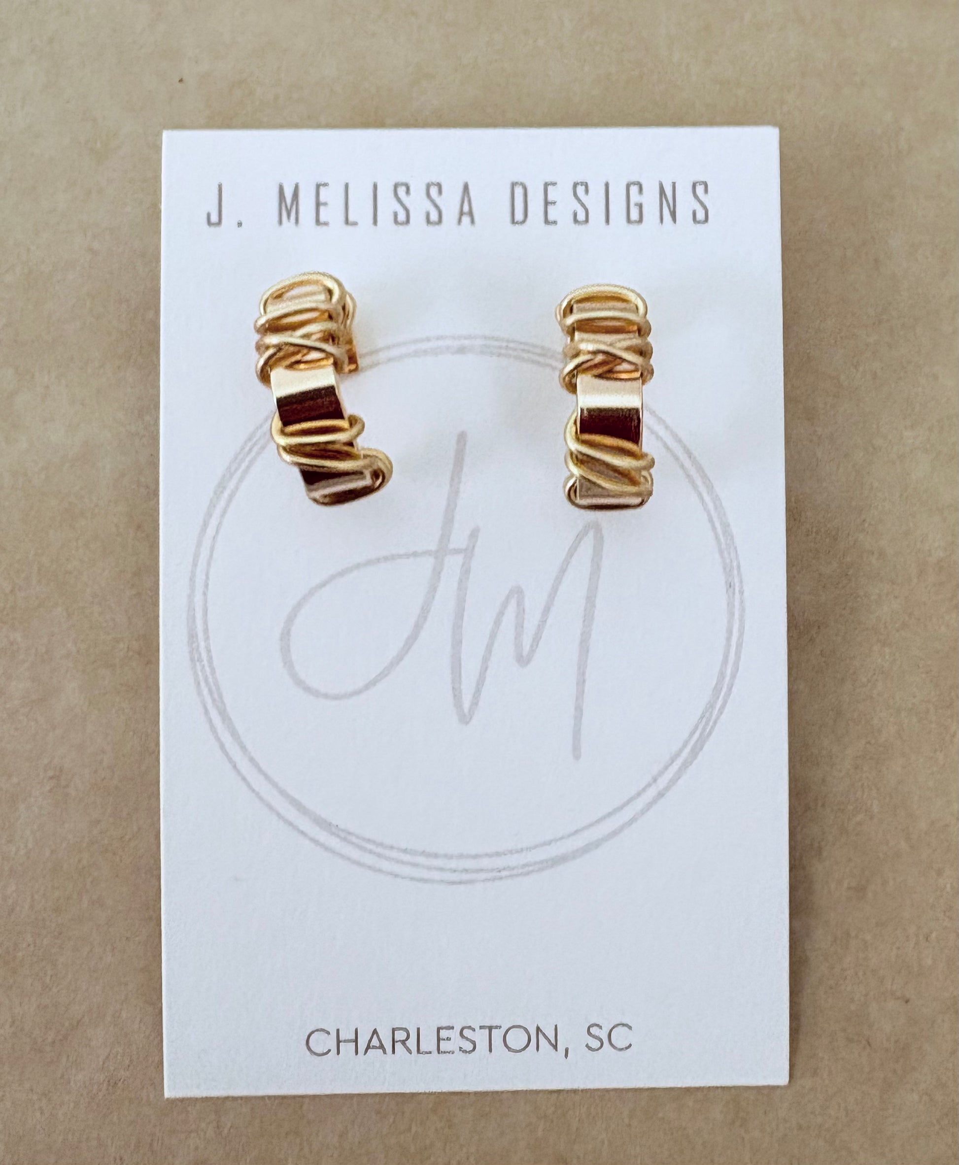Gold wire-wrapped earrings on a J. Melissa Designs card with 'Charleston, SC' text. ~ local Charleston jewelry