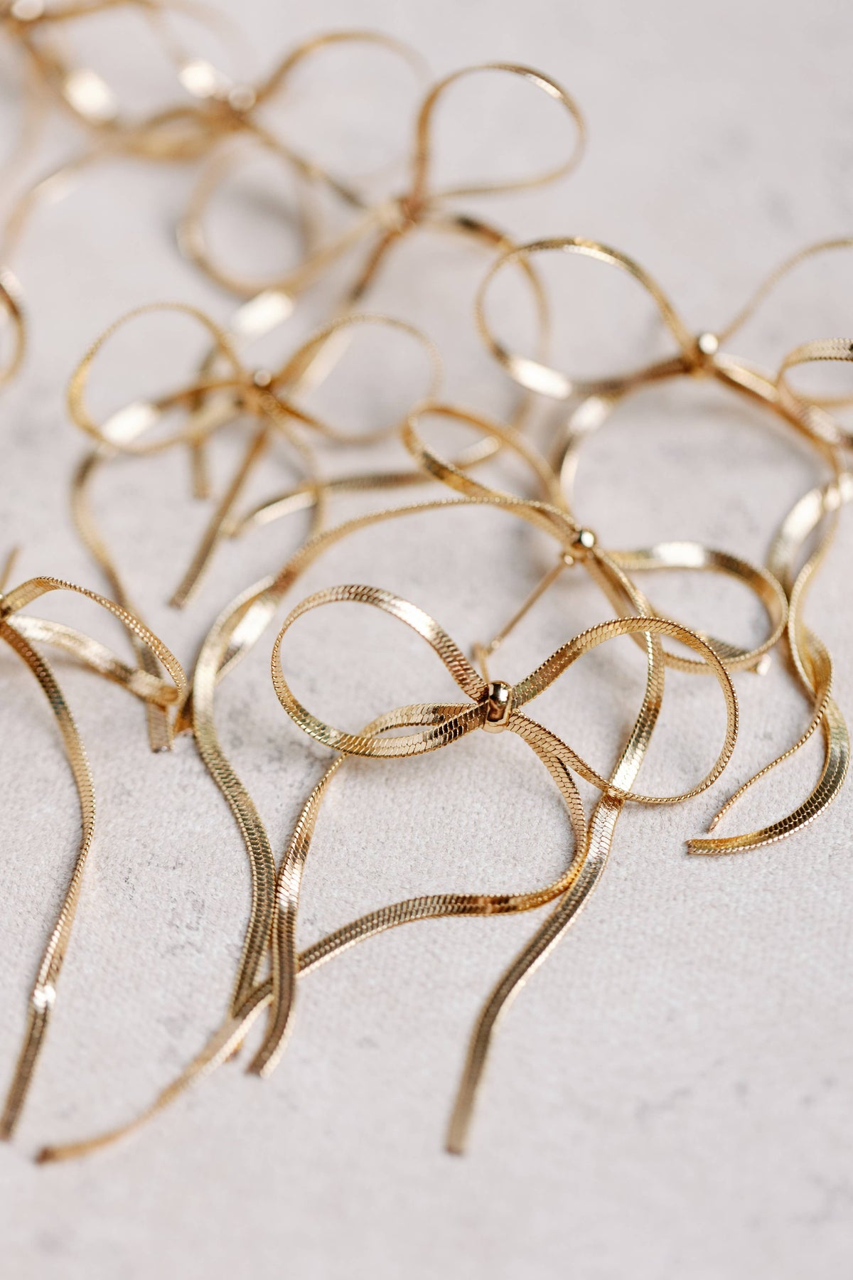 Maxi Gold Duster Bow Statement Earrings