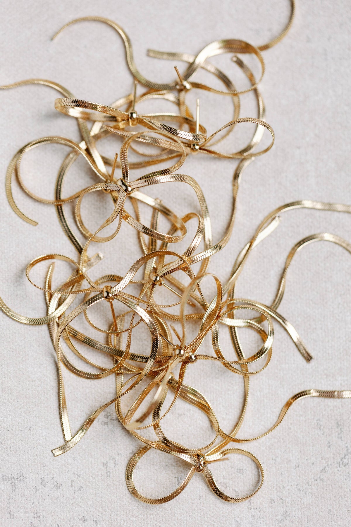Maxi Gold Duster Bow Statement Earrings