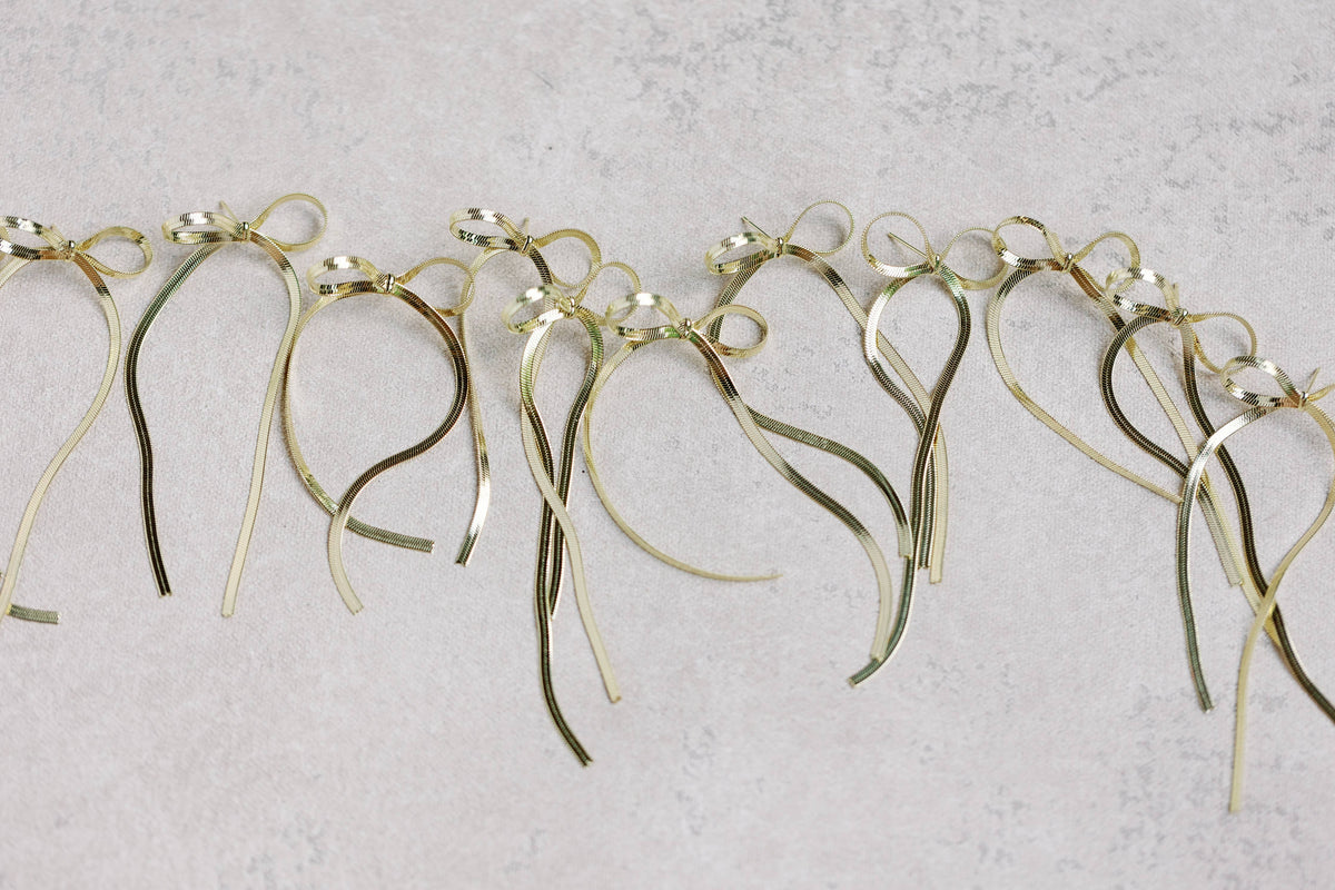 Maxi Gold Duster Bow Statement Earrings